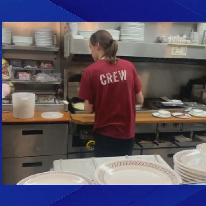 Local grill cook helps worker at another restaurant after spilling food